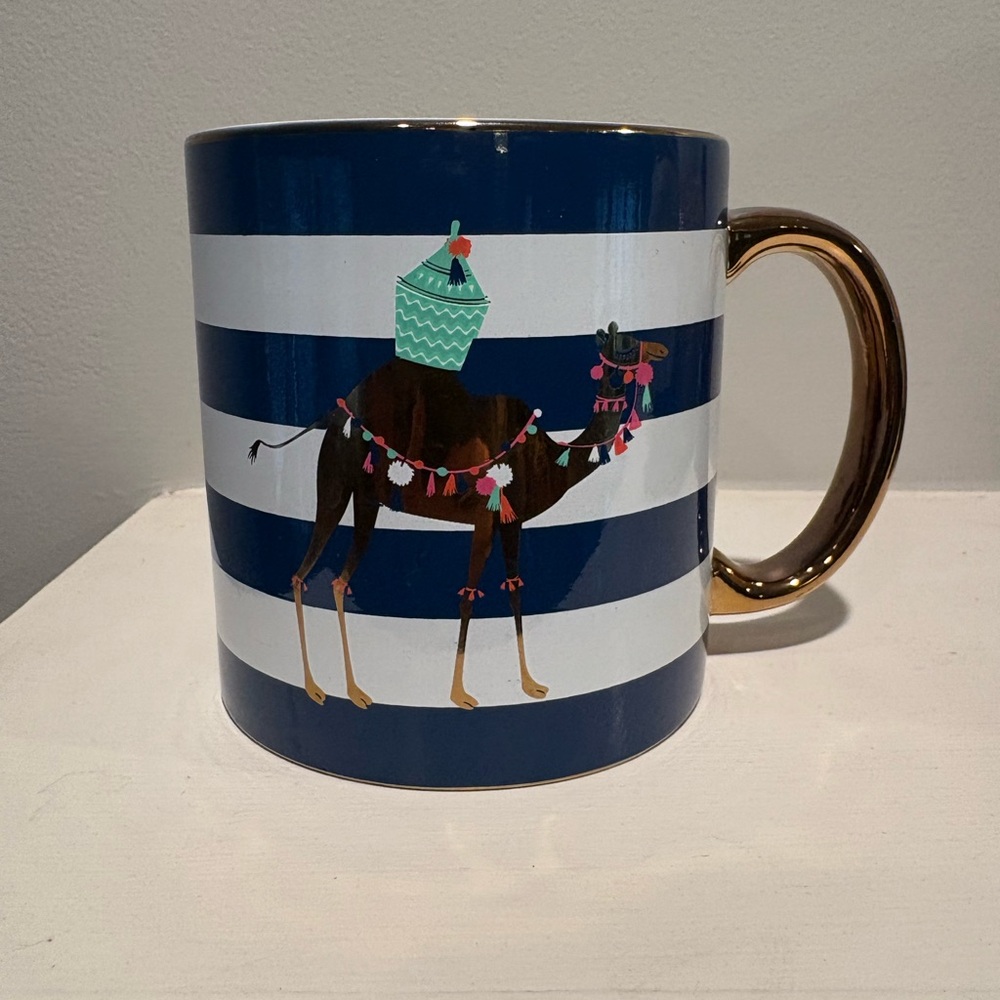 Large blue and white coffee mug with camel